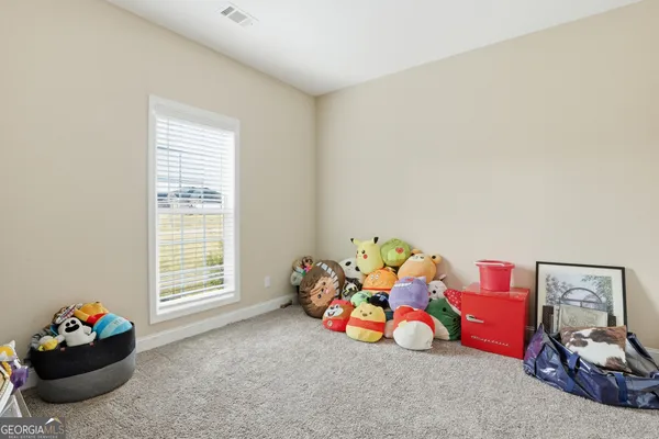 a play room with toys and toys