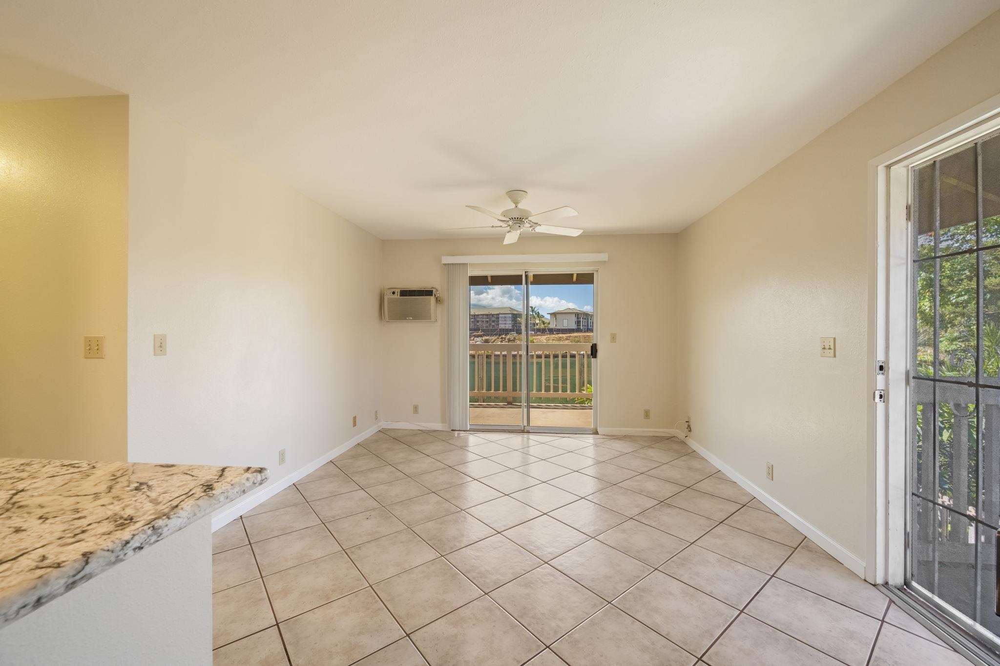 480 Kenolio Road, Unit 31205 Kihei, HI 96753 - Photo 17 of 45 a view of empty room with wooden floor