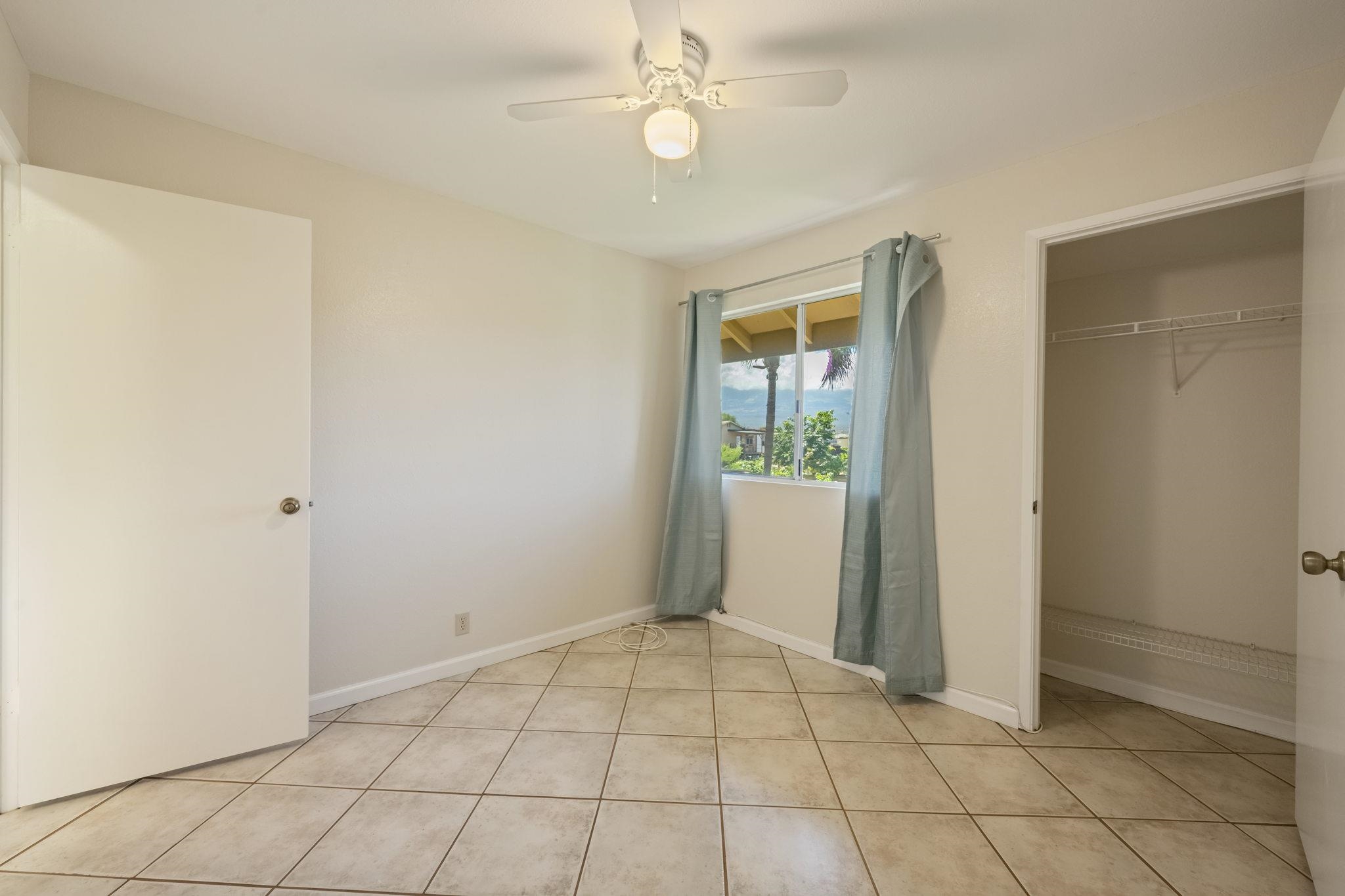 480 Kenolio Road, Unit 31205 Kihei, HI 96753 - Photo 37 of 45 an empty room with windows and closet