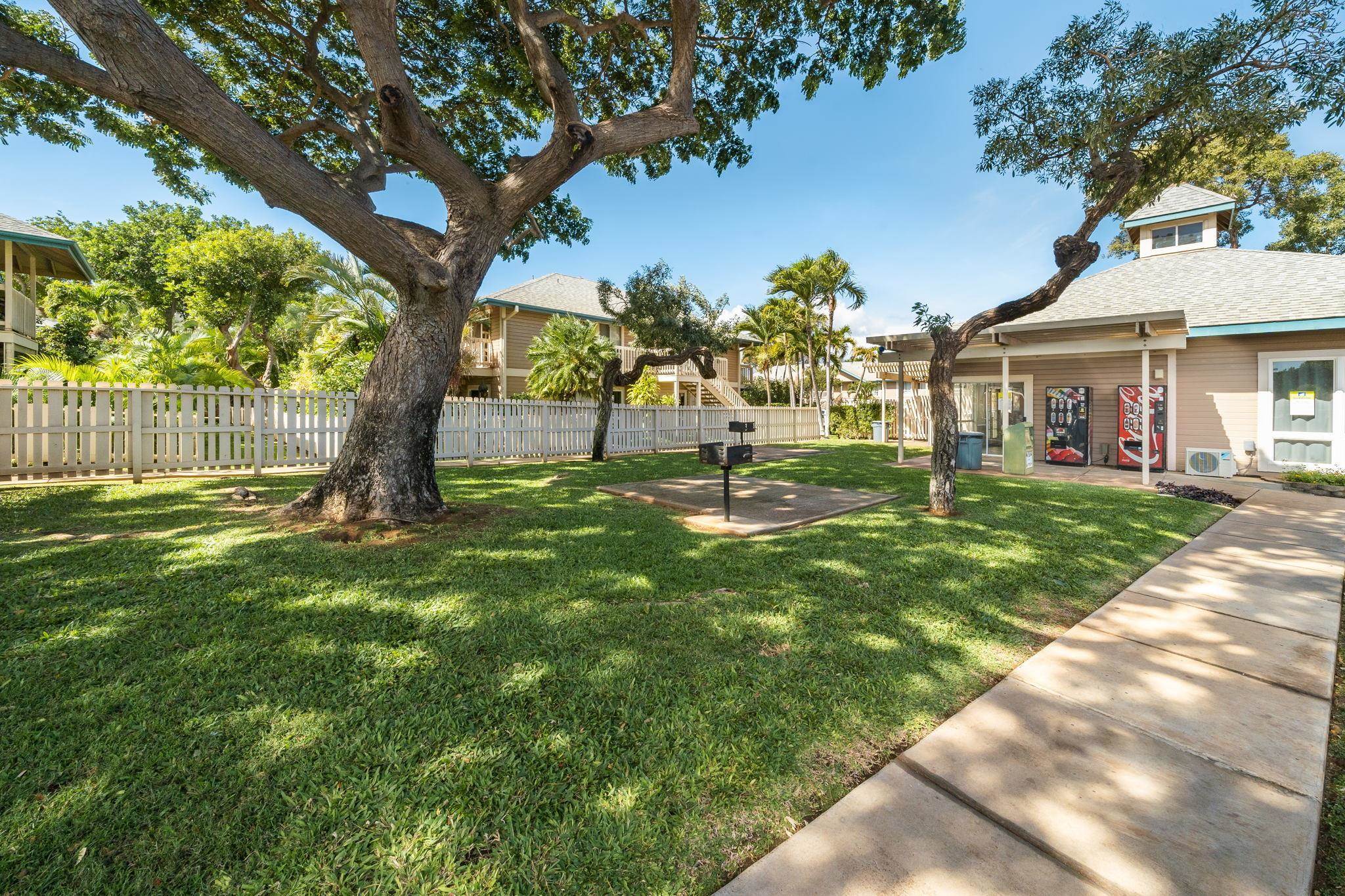 480 Kenolio Road, Unit 31205 Kihei, HI 96753 - Photo 43 of 45 a view of a house with a tree in a yard