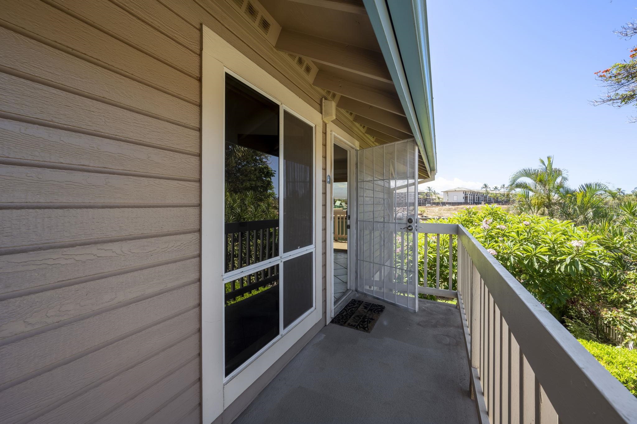 480 Kenolio Road, Unit 31205 Kihei, HI 96753 - Photo 7 of 45 a view of balcony with wooden floor and fence