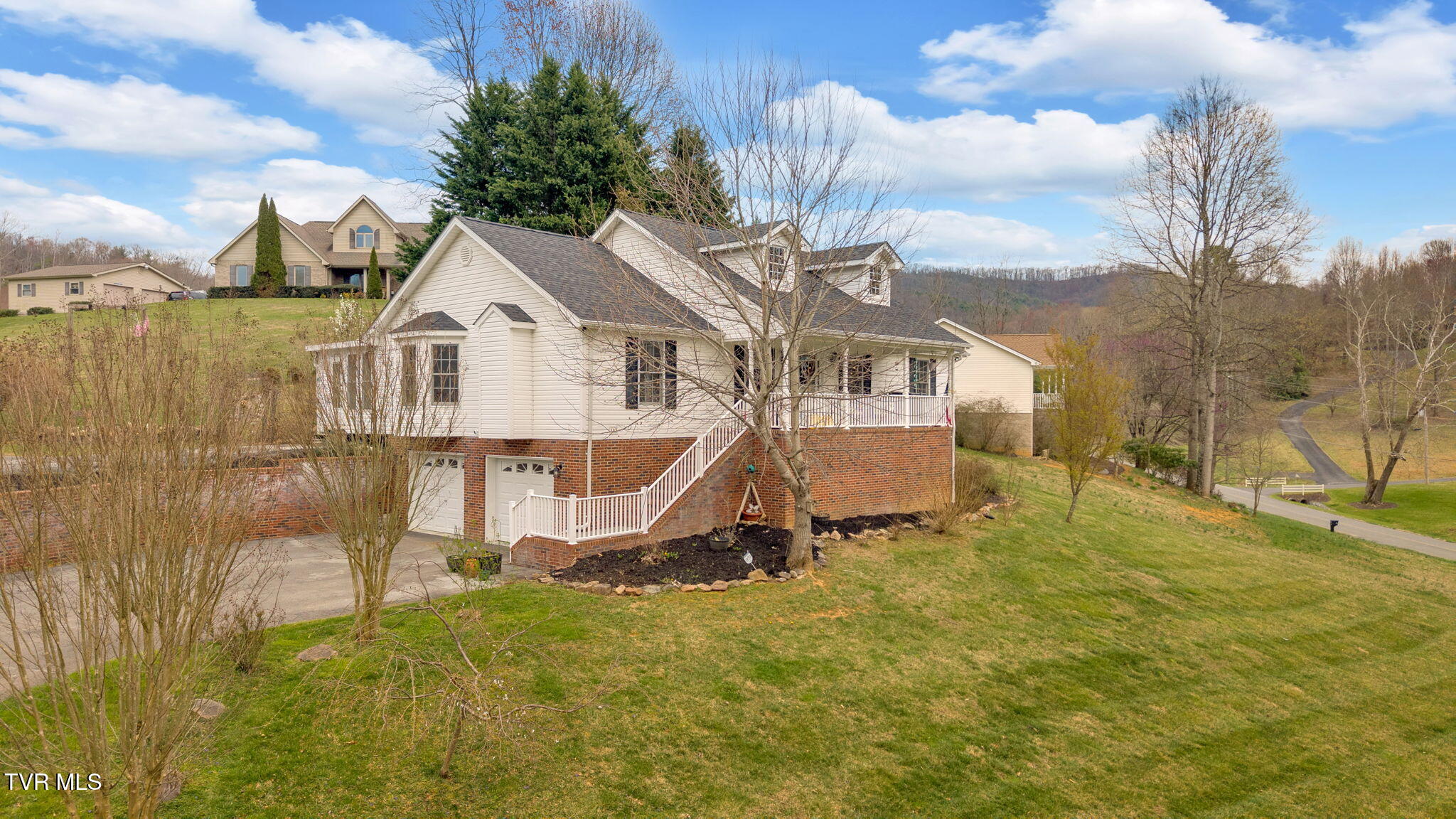 163 Springbrook Road Unicoi, TN 37692 - Photo 2 of 51 2-web-or-mls-DJI_20250327160845_0195_D