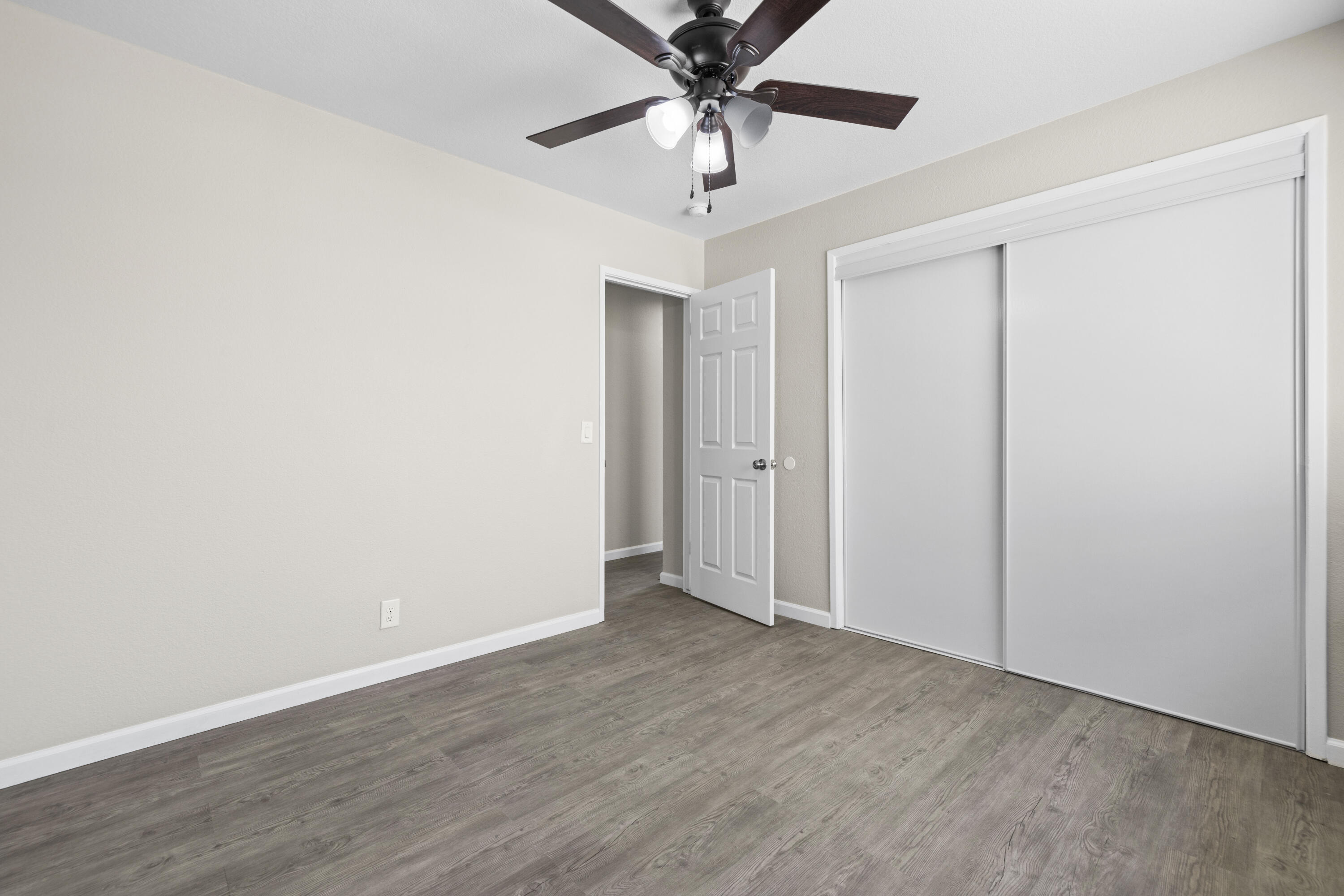 1270 Ave H4 Lancaster, CA 93534 - Photo 14 of 39 wooden floor in an empty room