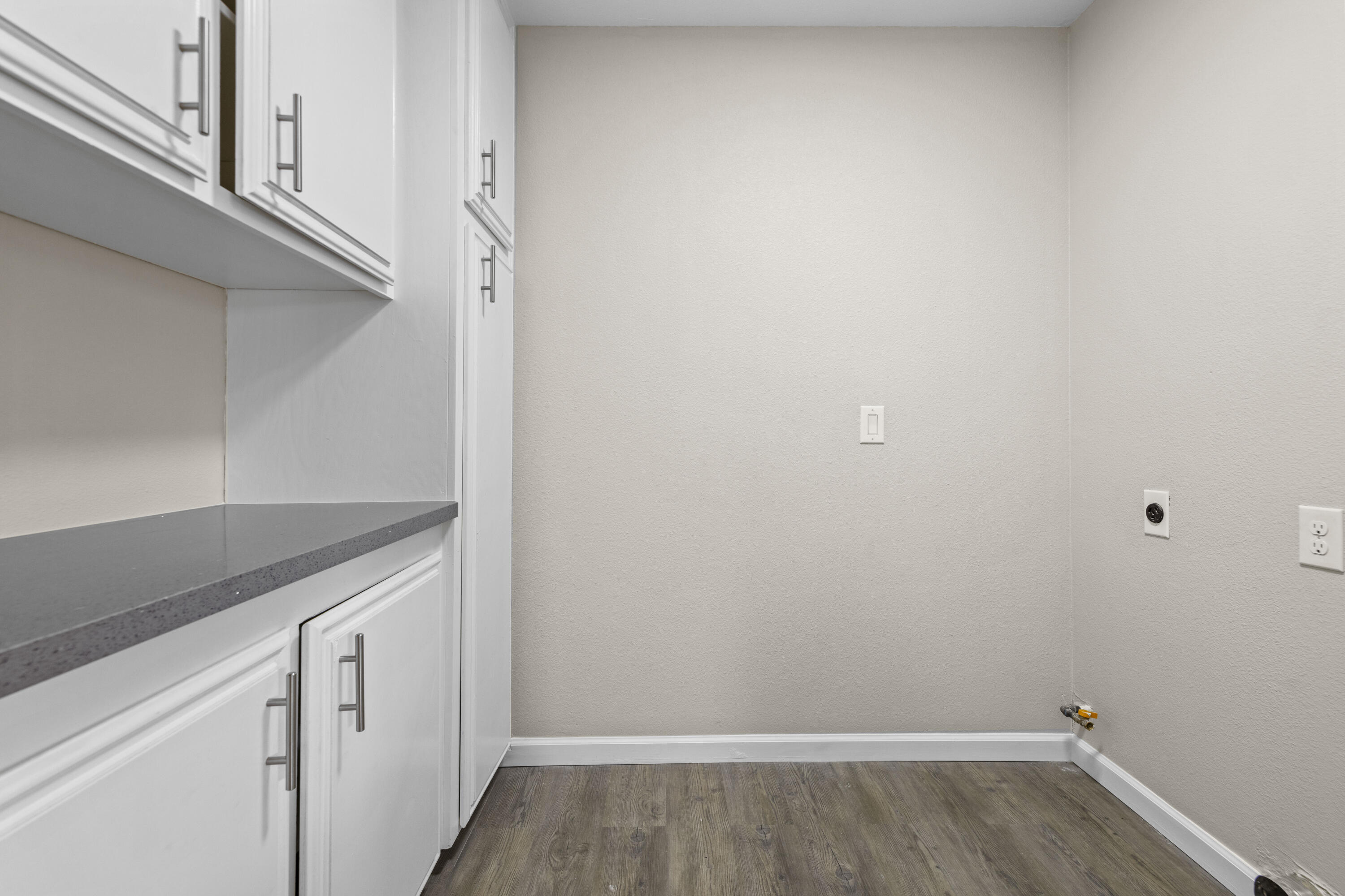1270 Ave H4 Lancaster, CA 93534 - Photo 15 of 39 a view of cabinets and wooden floor