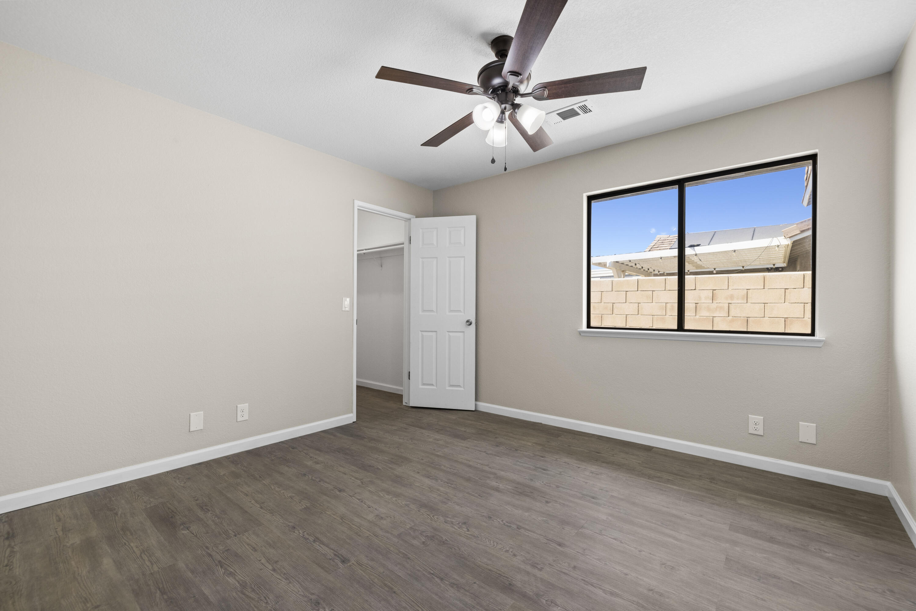 1270 Ave H4 Lancaster, CA 93534 - Photo 17 of 39 a view of an empty room with a window