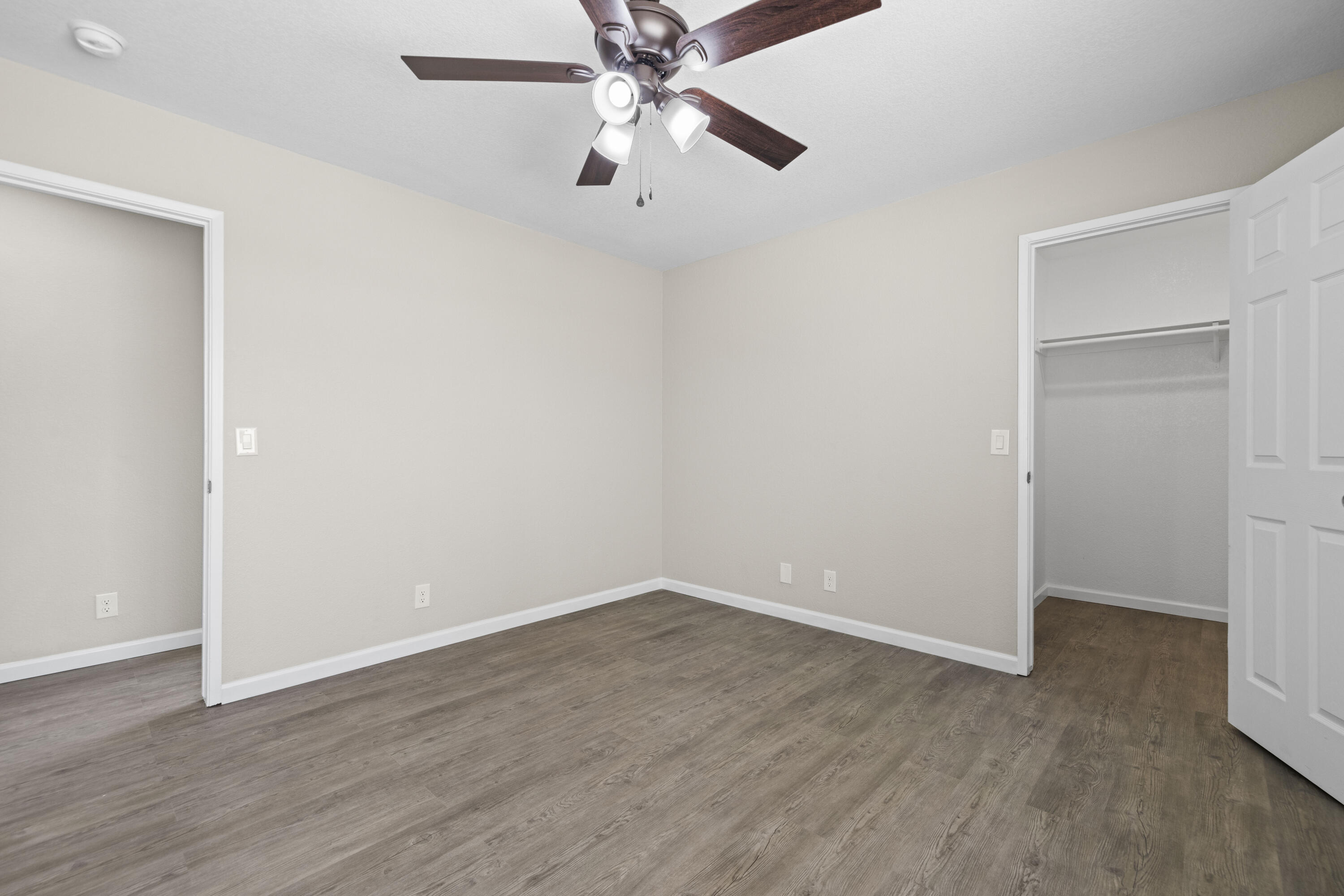 1270 Ave H4 Lancaster, CA 93534 - Photo 18 of 39 a view of an empty room with wooden floor