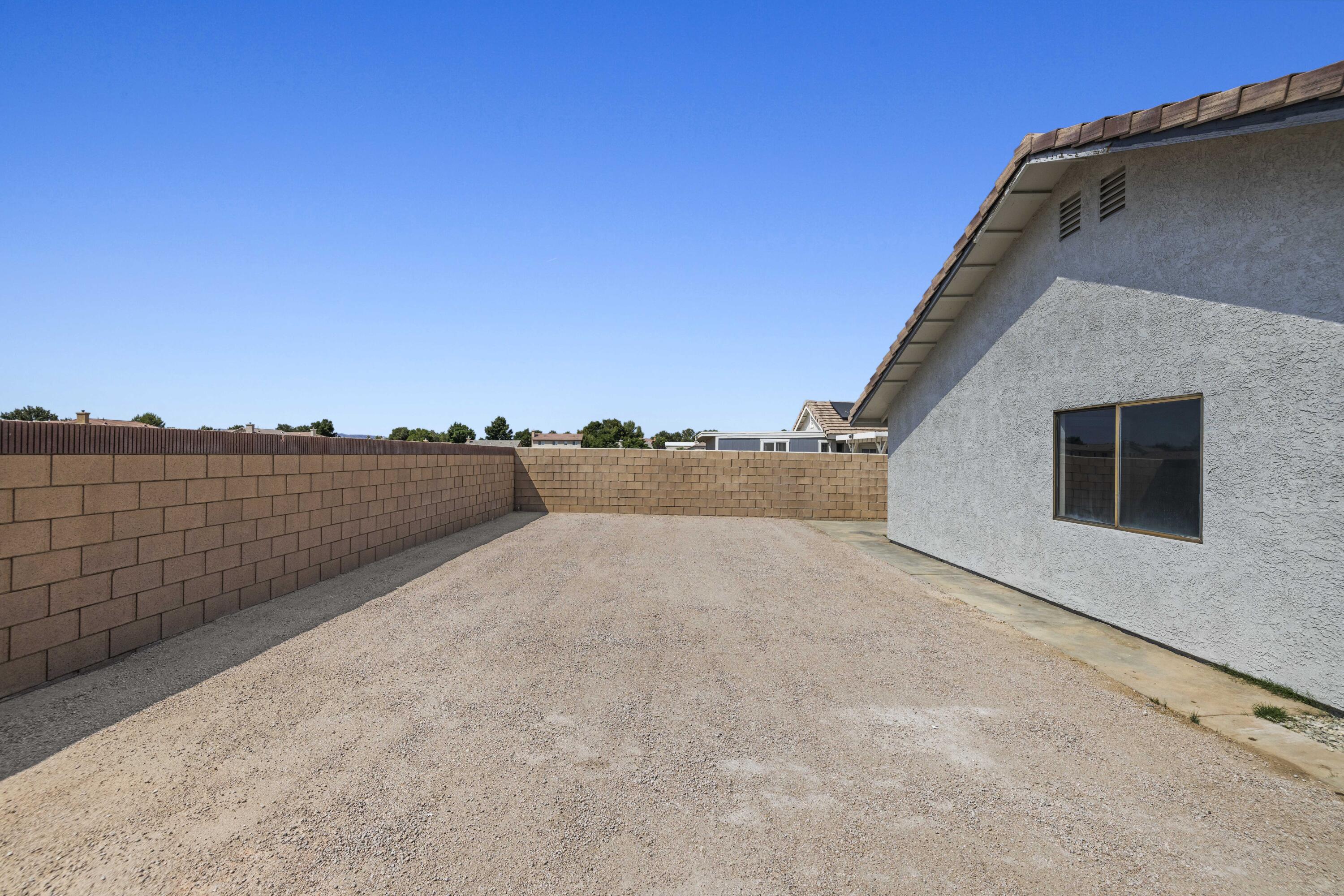 1270 Ave H4 Lancaster, CA 93534 - Photo 25 of 39 a view of outdoor space and building view