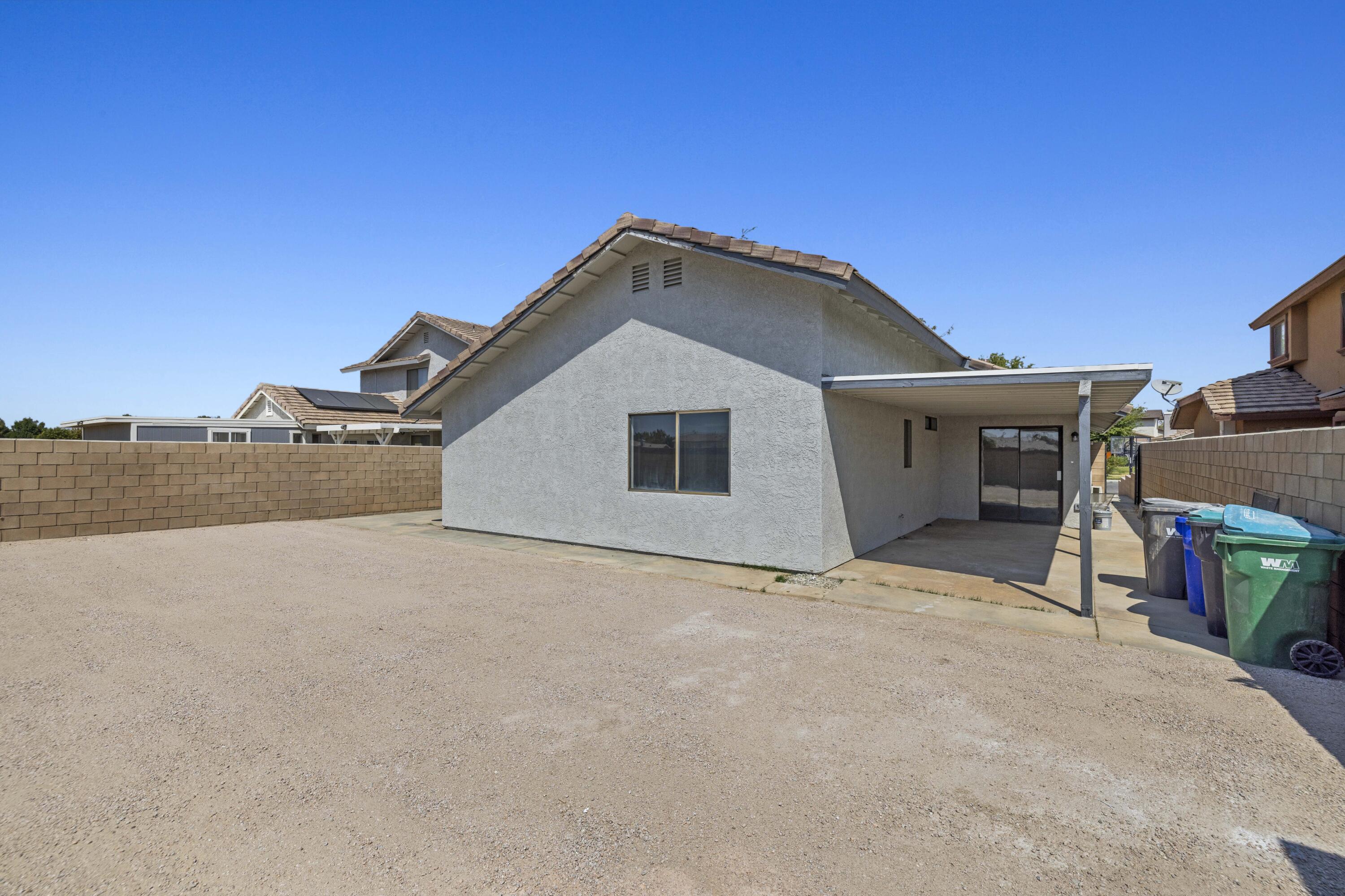 1270 Ave H4 Lancaster, CA 93534 - Photo 26 of 39 a view of a house with a outdoor space