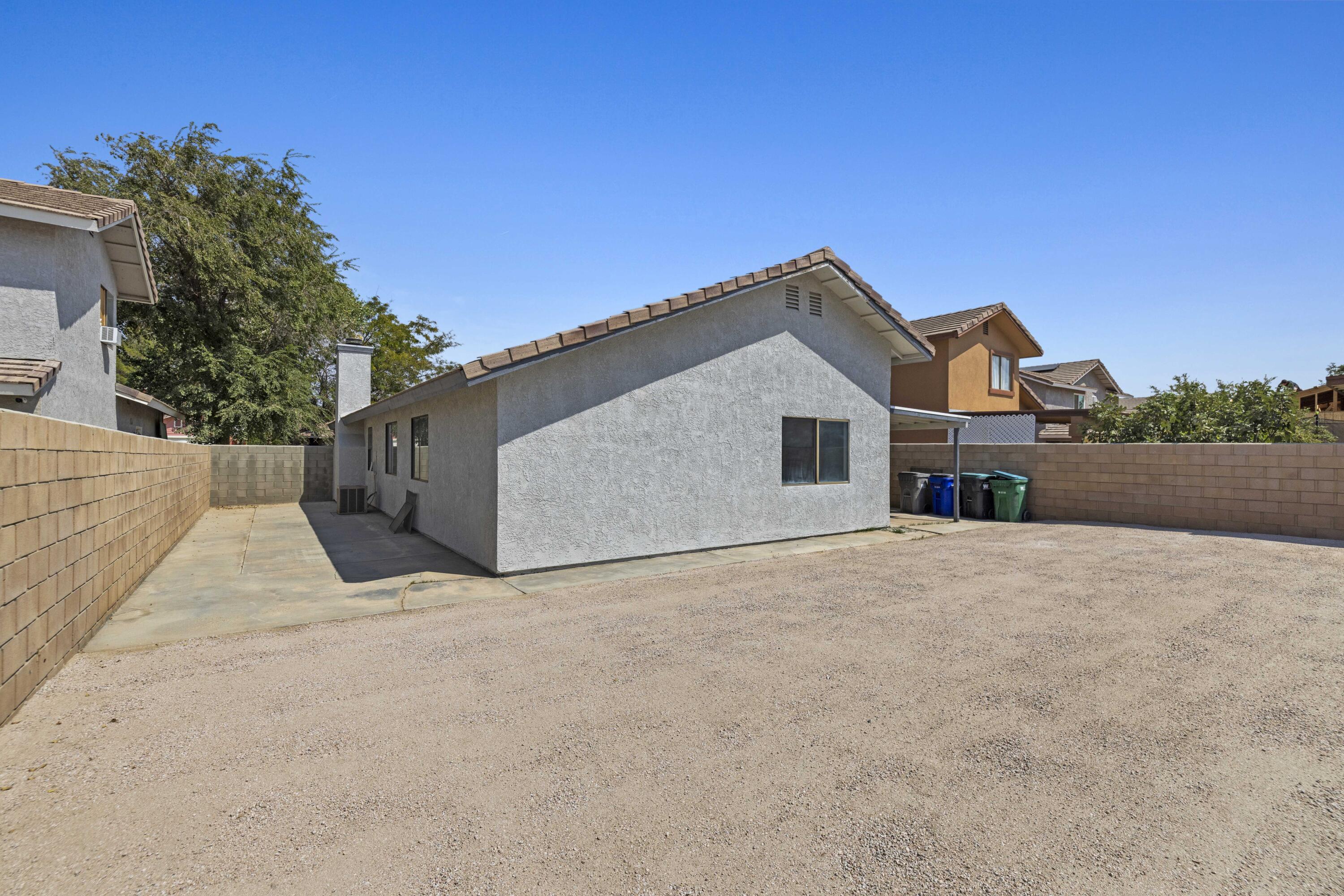 1270 Ave H4 Lancaster, CA 93534 - Photo 28 of 39 a view of a house with a yard