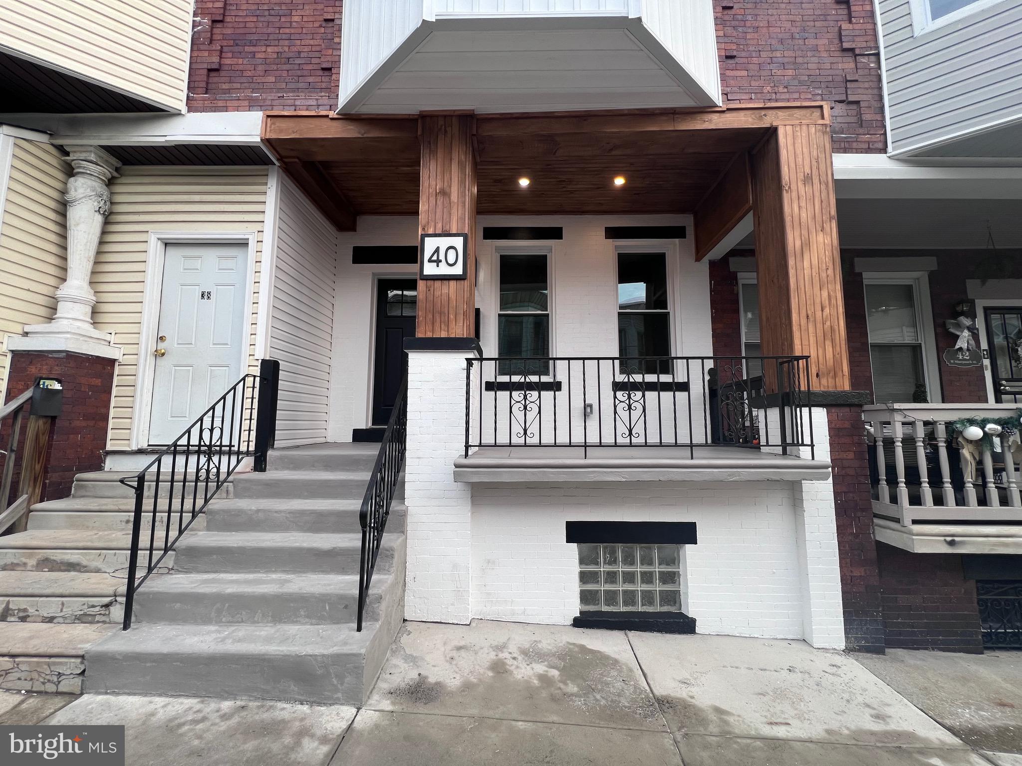 40 West Sharpnack Street Philadelphia, PA 19119 - Photo 4 of 18 a view of a house with entrance and door