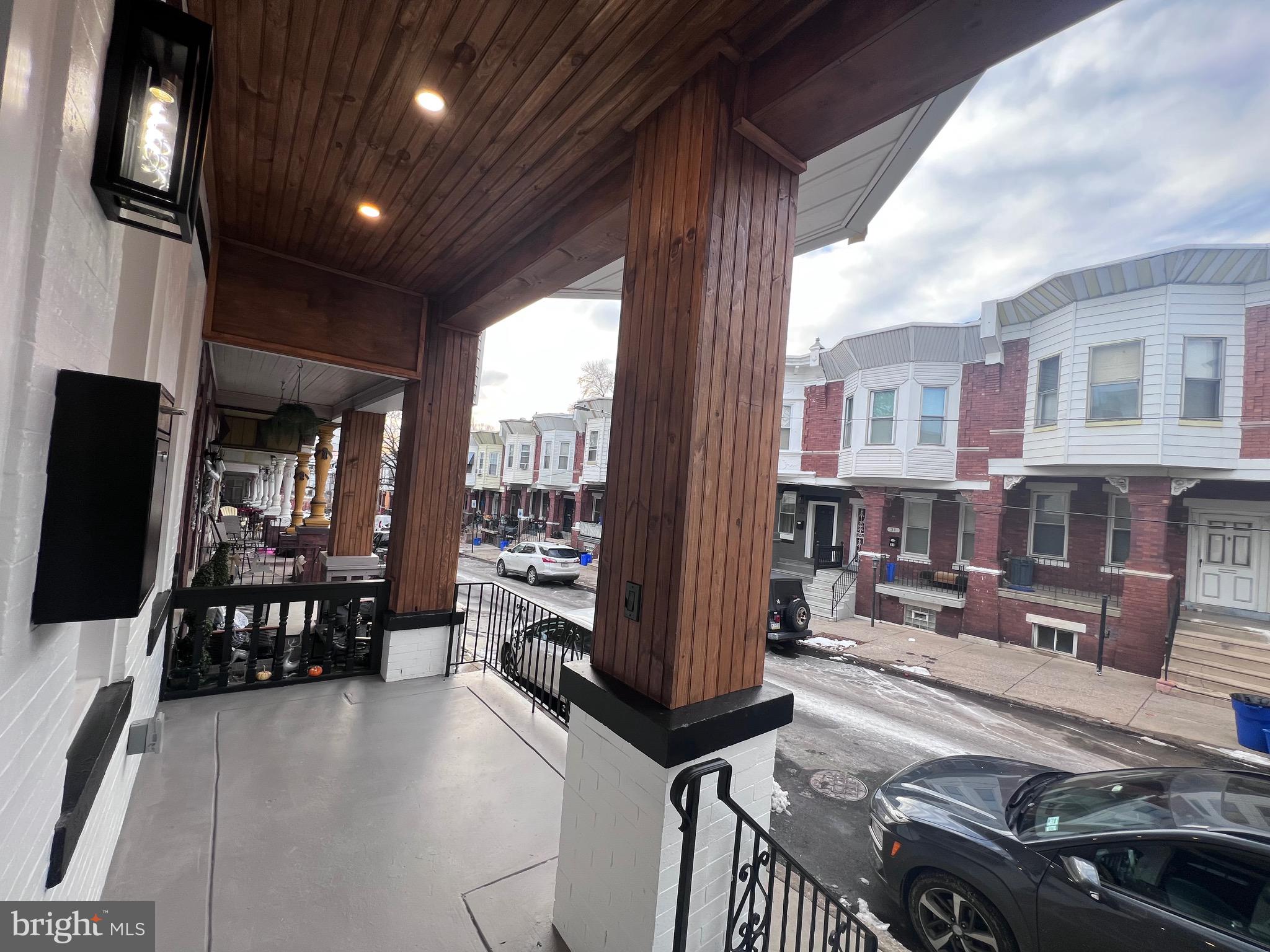 40 West Sharpnack Street Philadelphia, PA 19119 - Photo 8 of 18 a lobby with furniture and floor to ceiling window