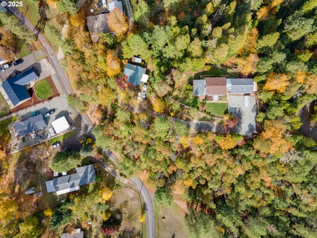 an aerial view of a house with a garden