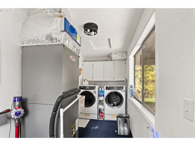a living room filled with furniture and a table