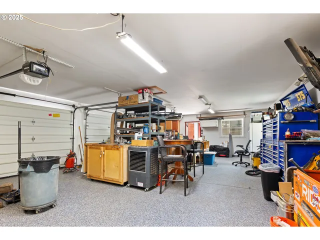 a living room with furniture a large window