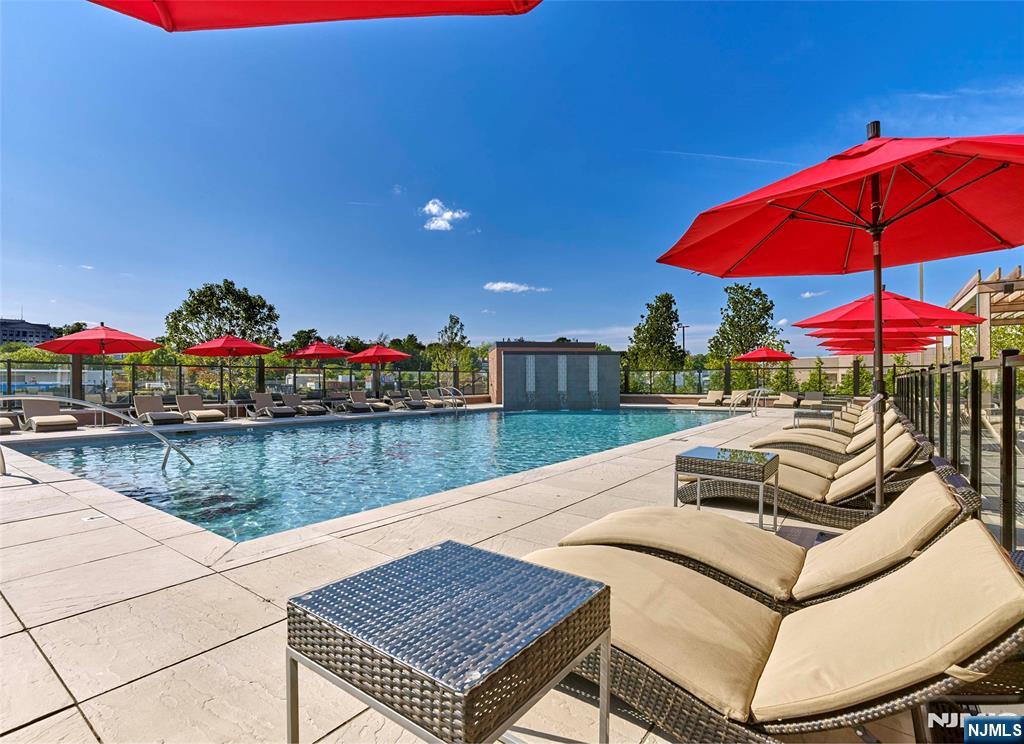 400 Sycamore Street, Unit 405 Kearny, NJ 07032 - Photo 25 of 28 a view of a swimming pool with a patio