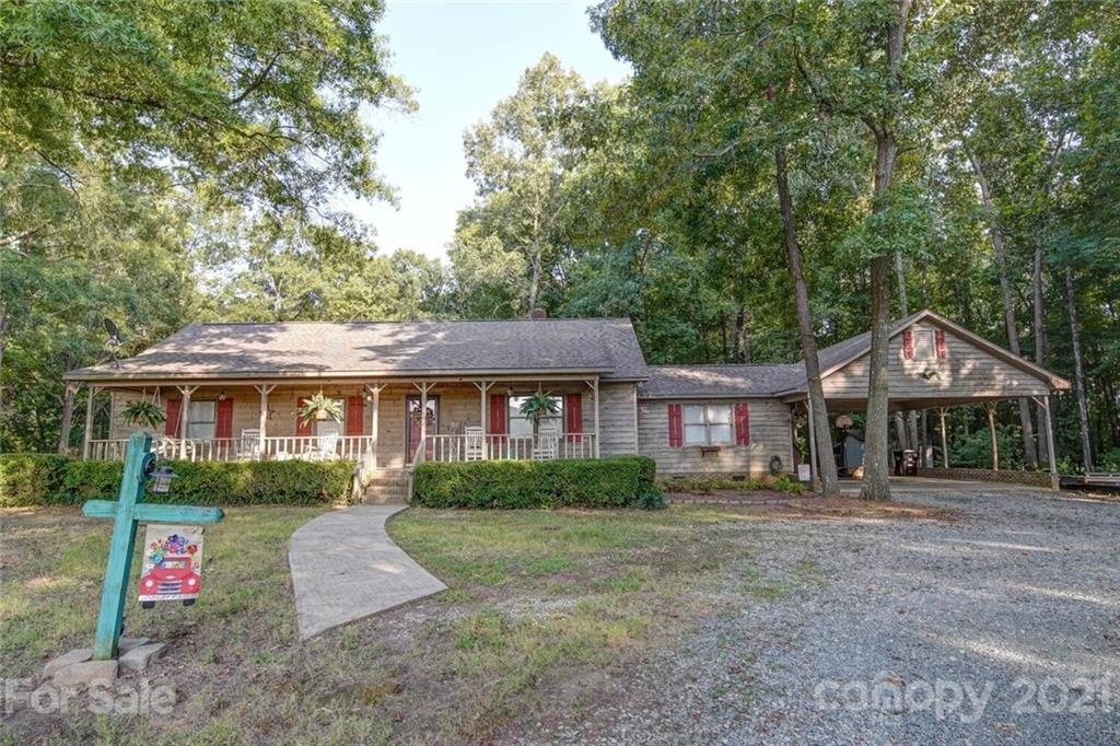 411 Gulledge Parker Road Monroe, NC 28112 - Photo 25 of 29 front view of a house with a yard