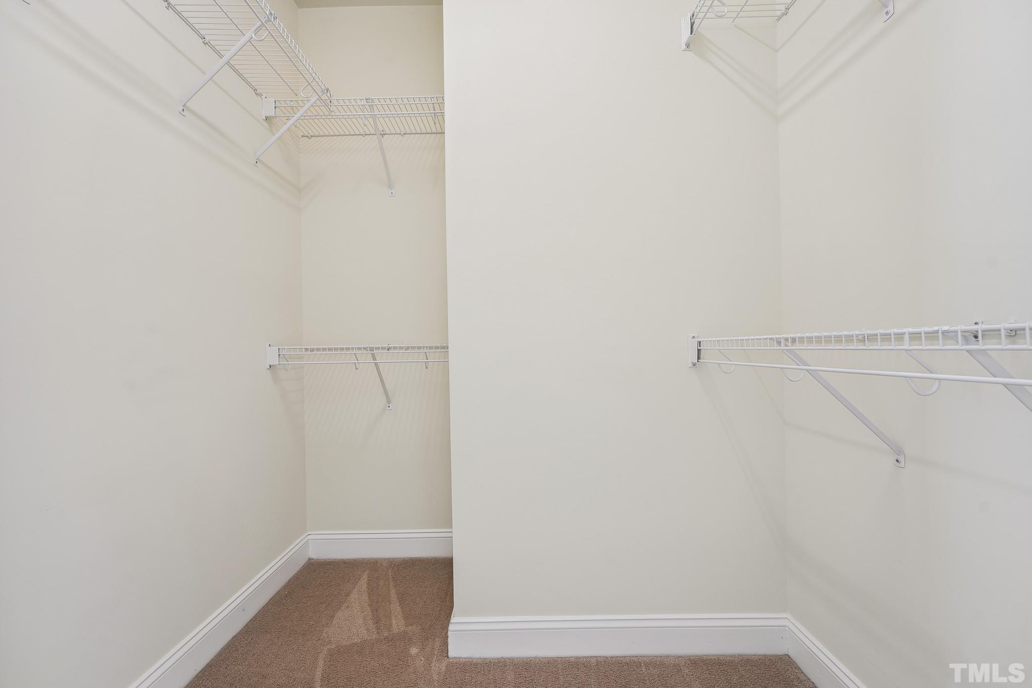 7710 ACC Boulevard Raleigh, NC 27617 - Photo 20 of 33 a view of small space with racks on the wall