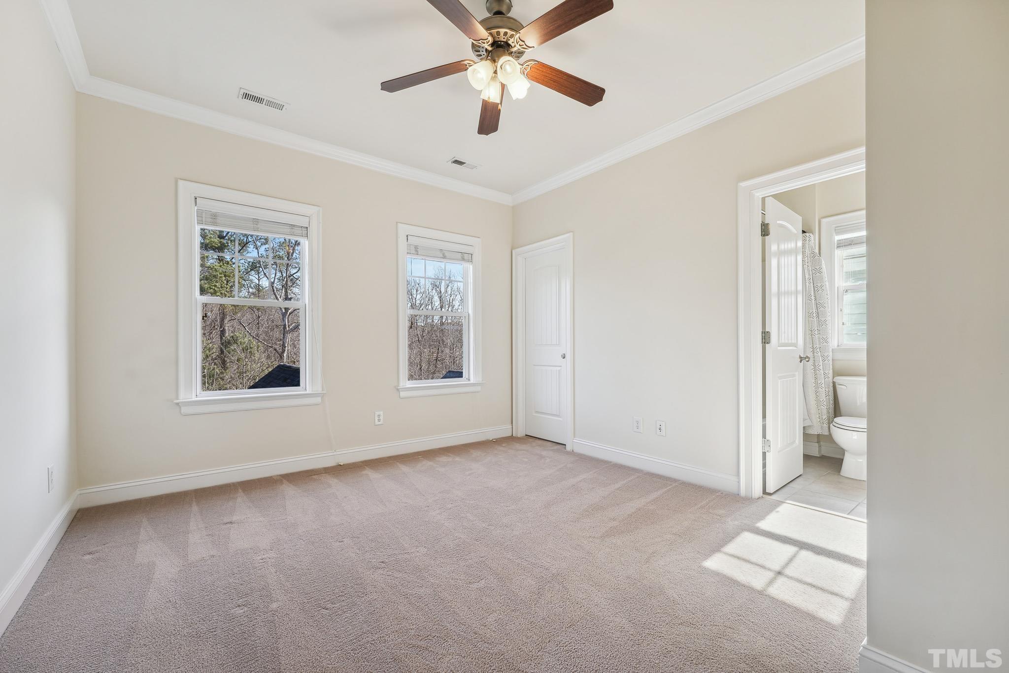 7710 ACC Boulevard Raleigh, NC 27617 - Photo 25 of 33 a view of an empty room with a window