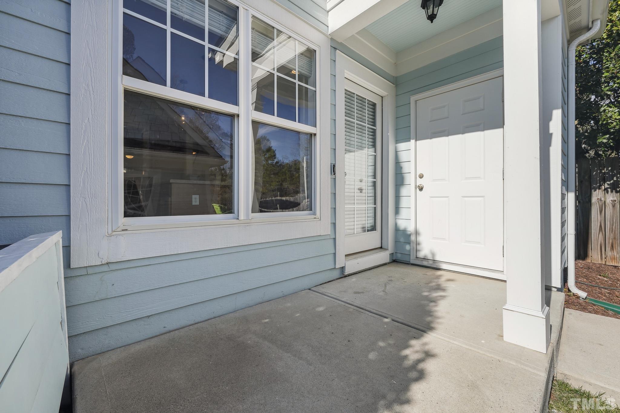 7710 ACC Boulevard Raleigh, NC 27617 - Photo 28 of 33 a view of house with a front door