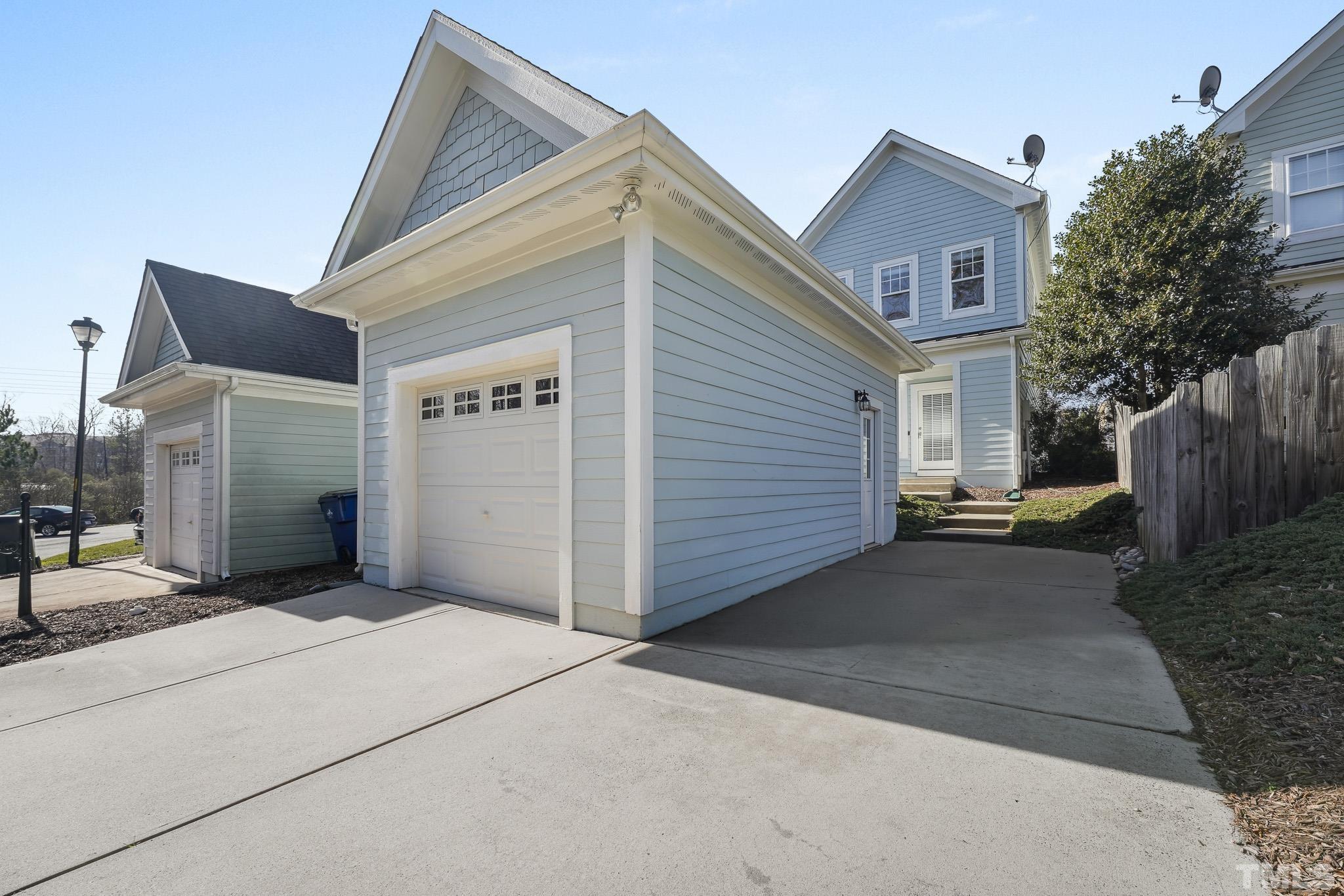 7710 ACC Boulevard Raleigh, NC 27617 - Photo 31 of 33 a view of a house with a garage