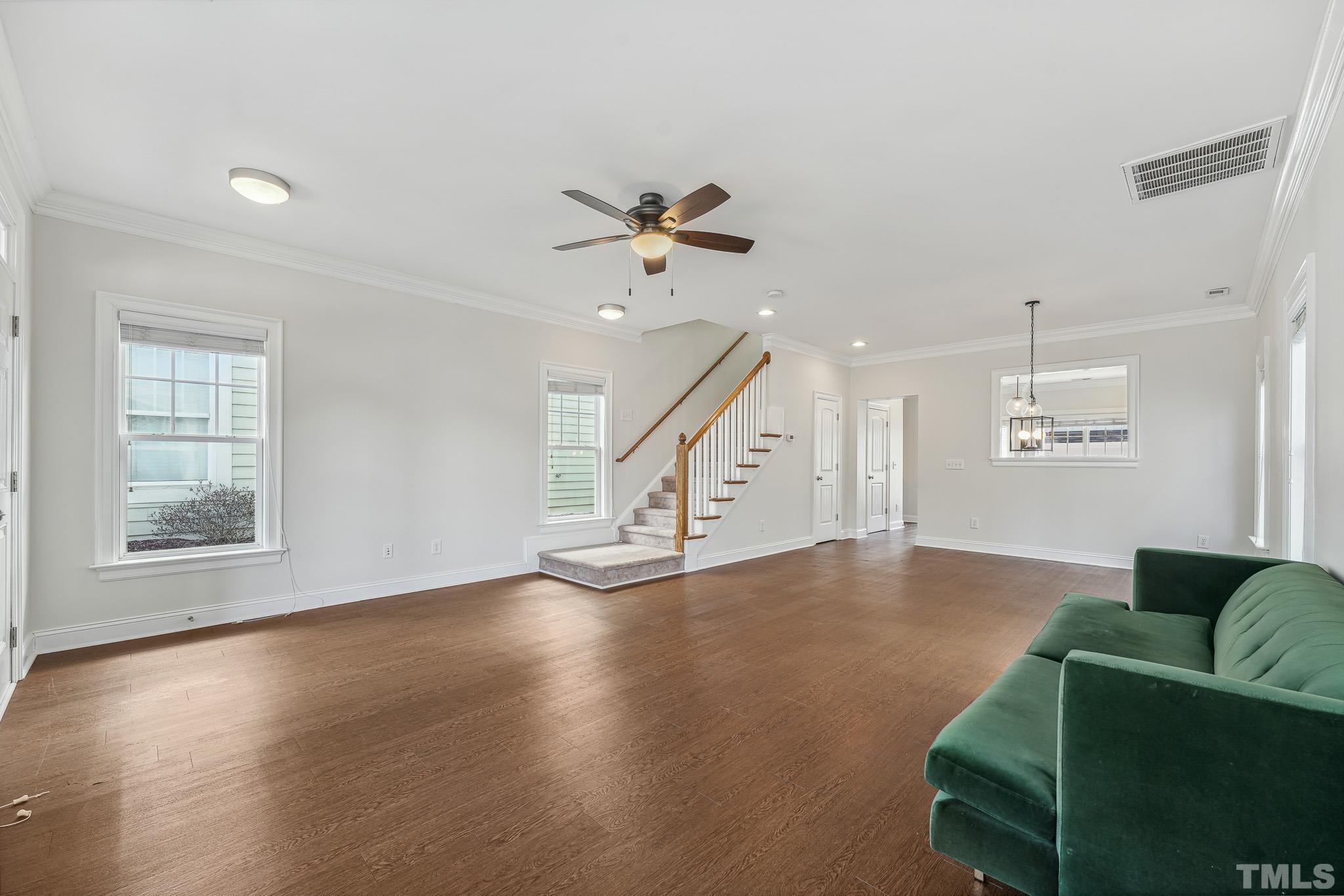 7710 ACC Boulevard Raleigh, NC 27617 - Photo 6 of 33 a view of livingroom and hardwood floor