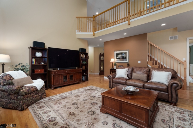 110 Orchard Road Skillman, NJ 08558 - Photo 17 of 43 a living room with furniture and a flat screen tv