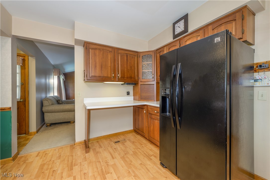 6571 Peck Road Ravenna, OH 44266 - Photo 4 of 44 Additional view of the kitchen, black refrigerator with ice dispenser