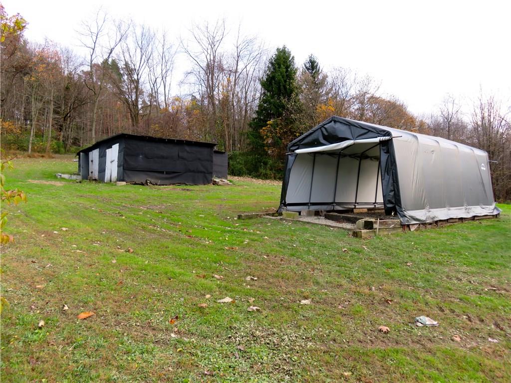 294 Sportsmen Road Hunker, PA 15639 - Photo 16 of 19 Covered carport and shed