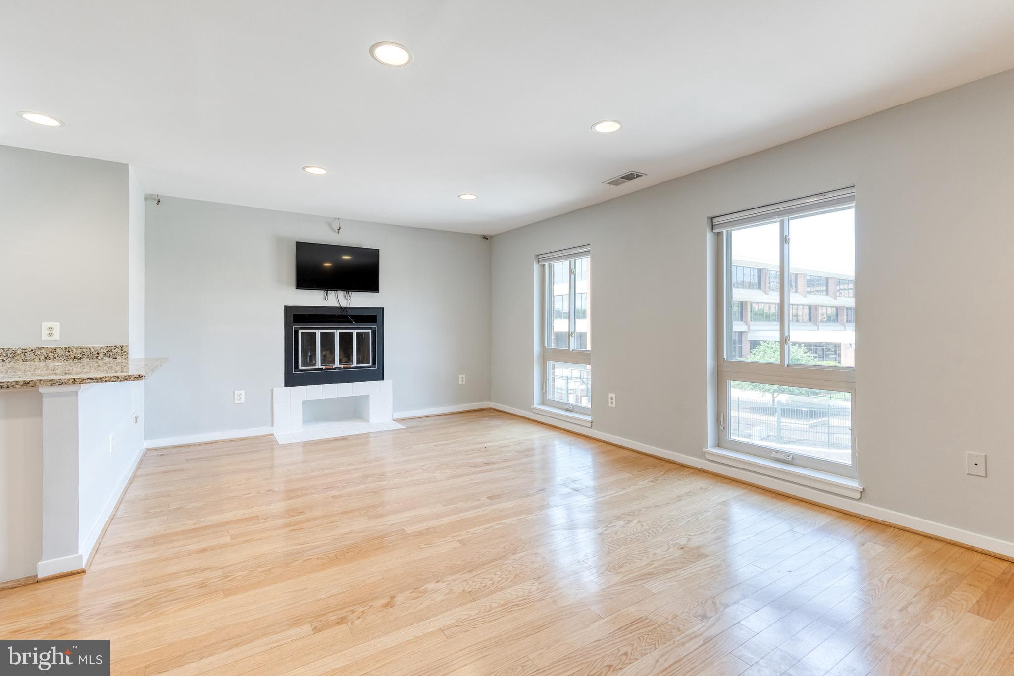 425 South Sharp Street, Unit R 15 Baltimore, MD 21201 - Photo 4 of 29 a view of an empty room with a window