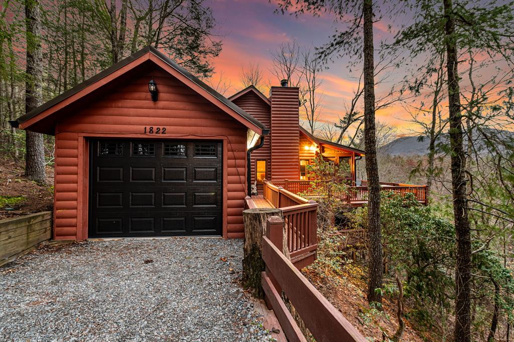 a front view of a house with a garage
