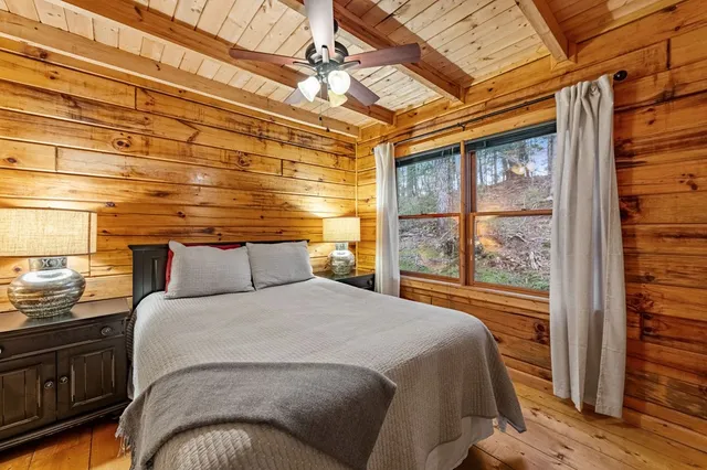 a bathroom with a sink mirror vanity and toilet