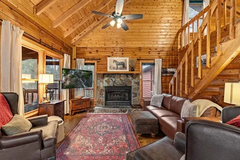 a view of a livingroom with furniture and a couch