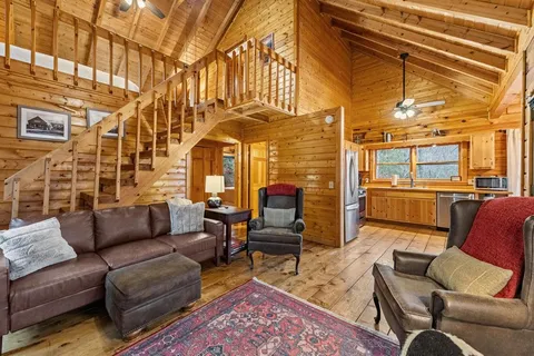 a view of a hall with wooden floor