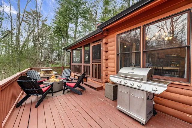 a view of a bench on wooden deck