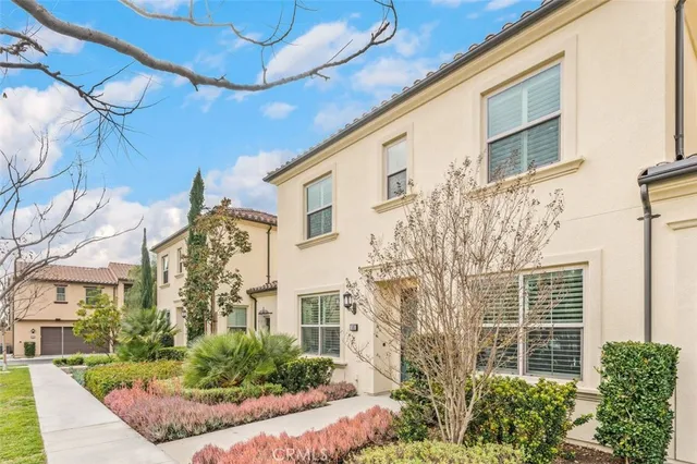 a view of a building with a yard