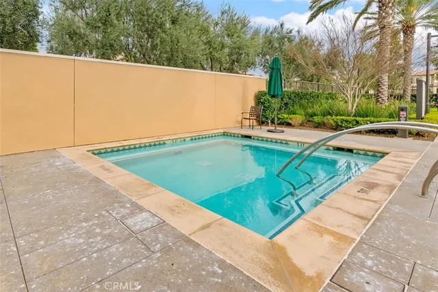 a outdoor dining space with furniture and wooden floor