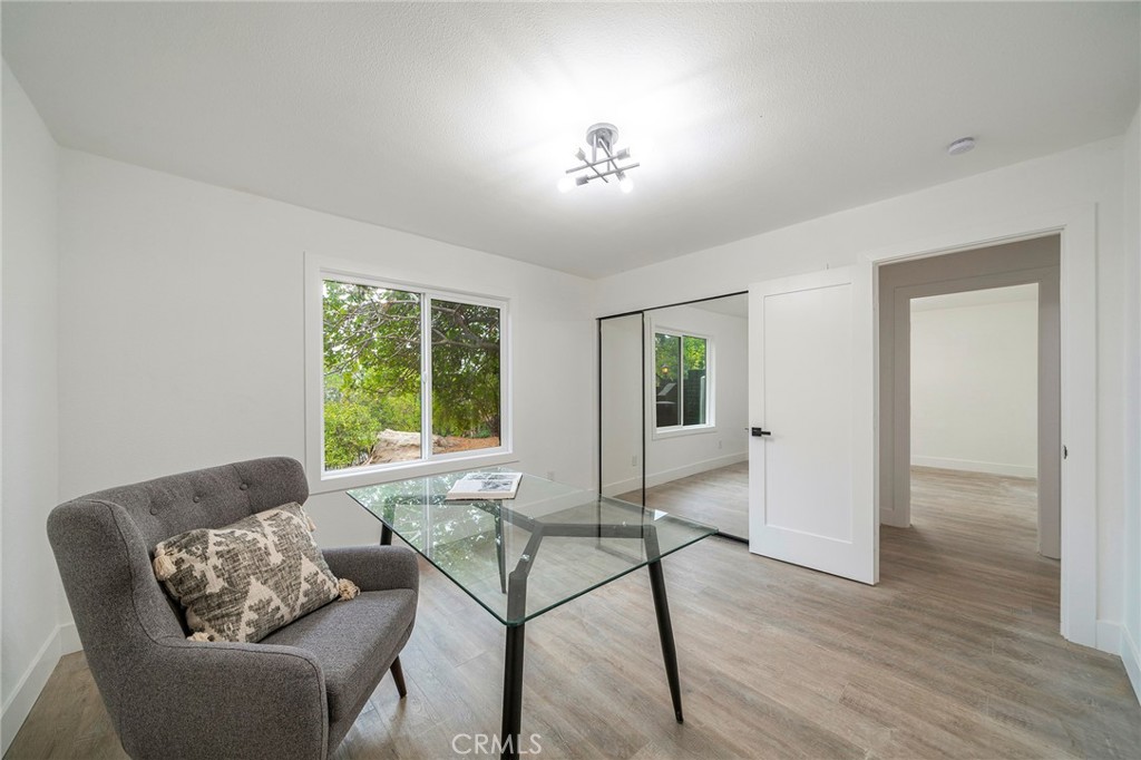2225 Da Vinci Drive Riverside, CA 92506 - Photo 22 of 60 a living room with furniture and a large window