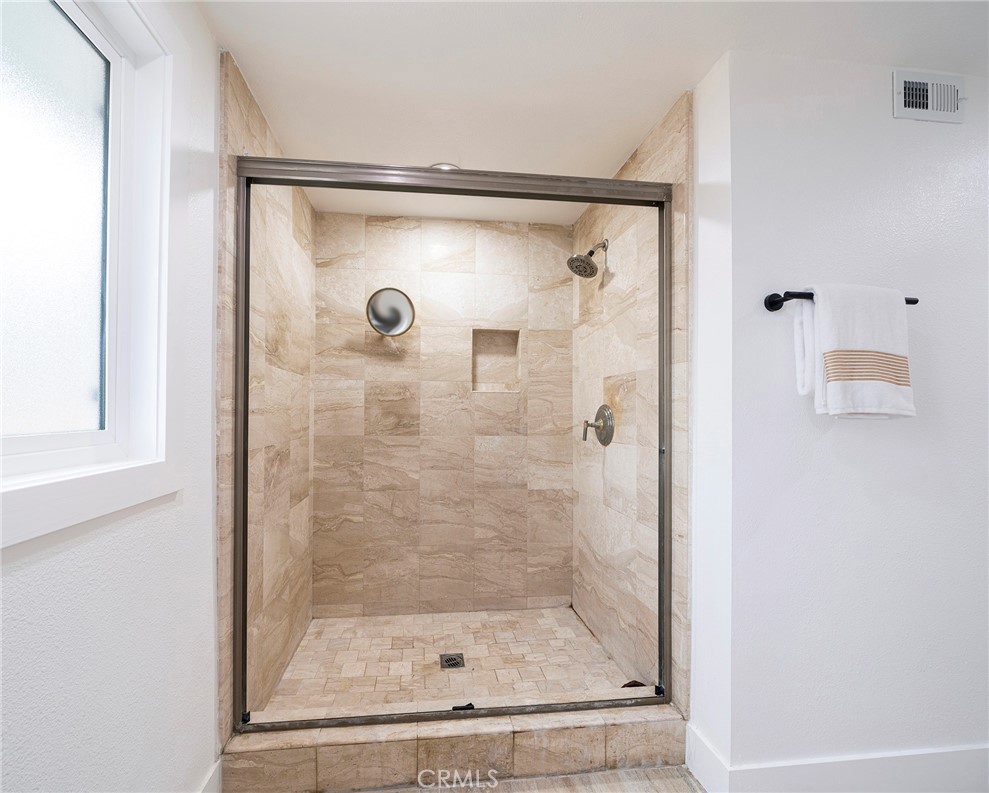 2225 Da Vinci Drive Riverside, CA 92506 - Photo 26 of 60 a bathroom with a shower