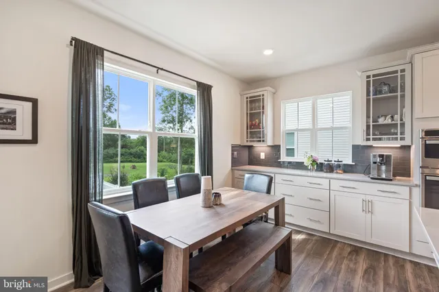 a bathroom with a toilet sink and shower