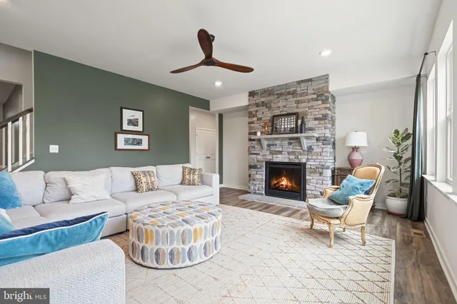 a view of a house with a yard patio and a yard