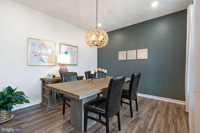 a living room with furniture a window and a fireplace