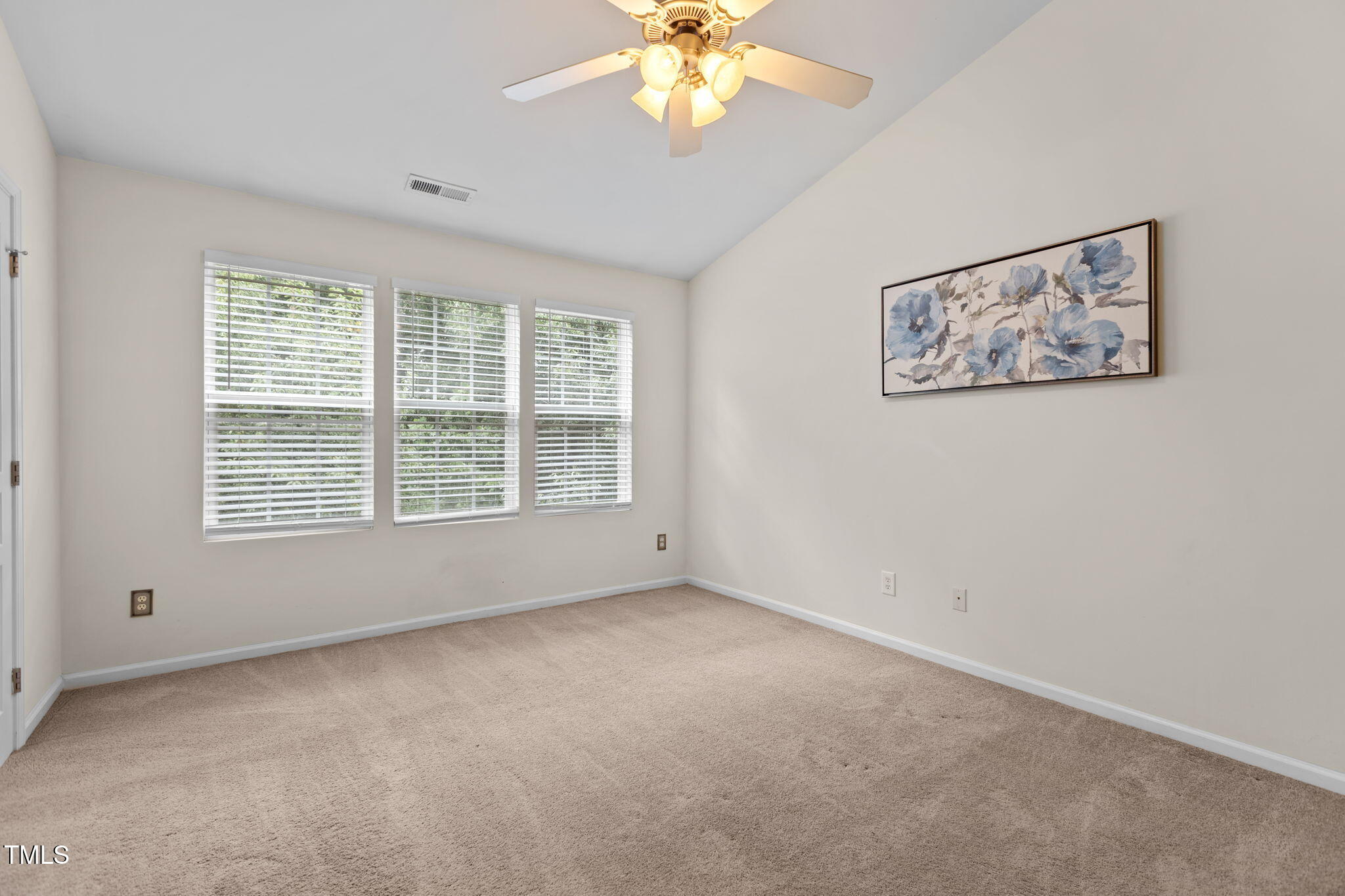 648 Cupola Drive Raleigh, NC 27603 - Photo 16 of 31 an empty room with a window