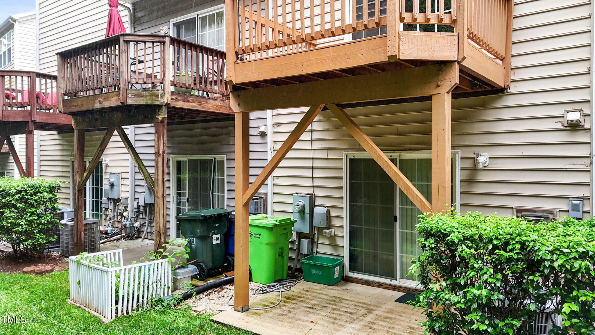 648 Cupola Drive Raleigh, NC 27603 - Photo 25 of 31 a view of a house with a potted plant and stairs