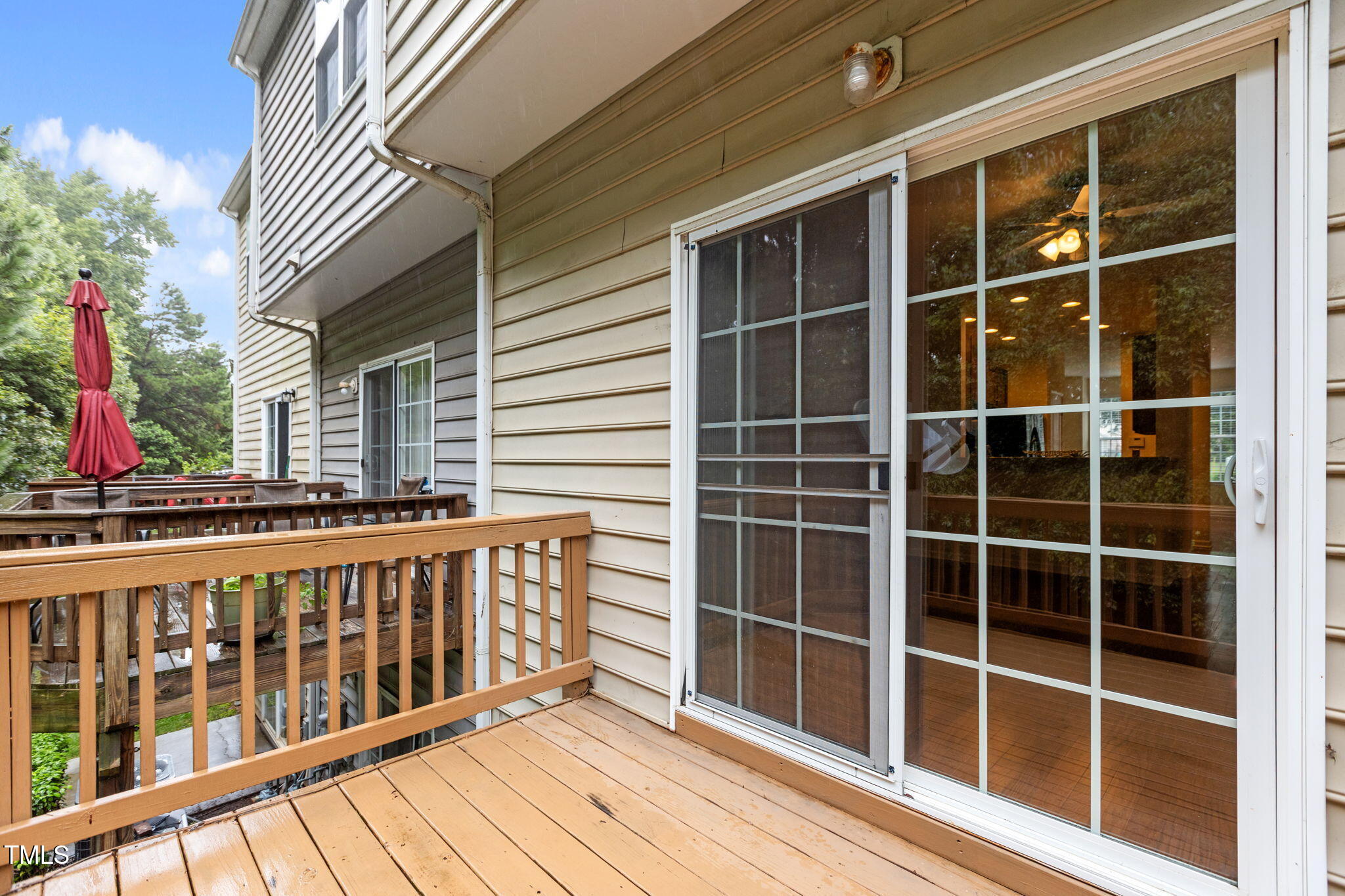 648 Cupola Drive Raleigh, NC 27603 - Photo 27 of 31 a view of a wooden deck and a yard