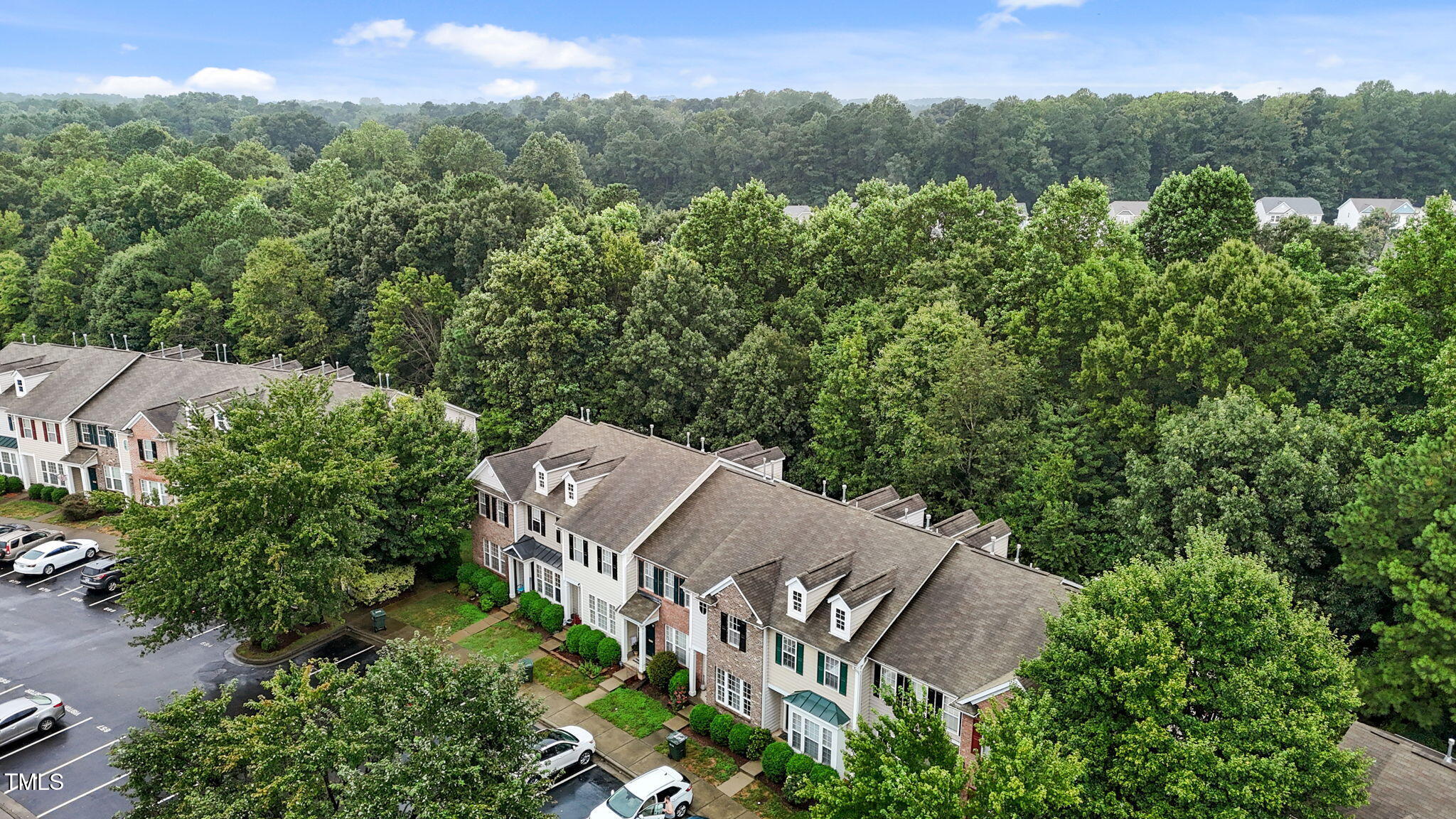 648 Cupola Drive Raleigh, NC 27603 - Photo 31 of 31 an aerial view of a house with a yard and lake view
