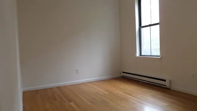 an empty room with window