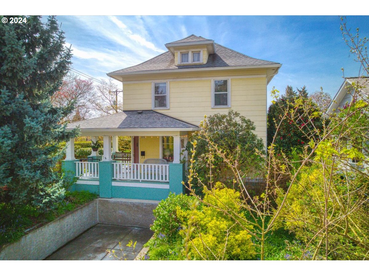 3752 Southeast Alder Street Portland, OR 97214 - Photo 2 of 44 a front view of a house with a yard