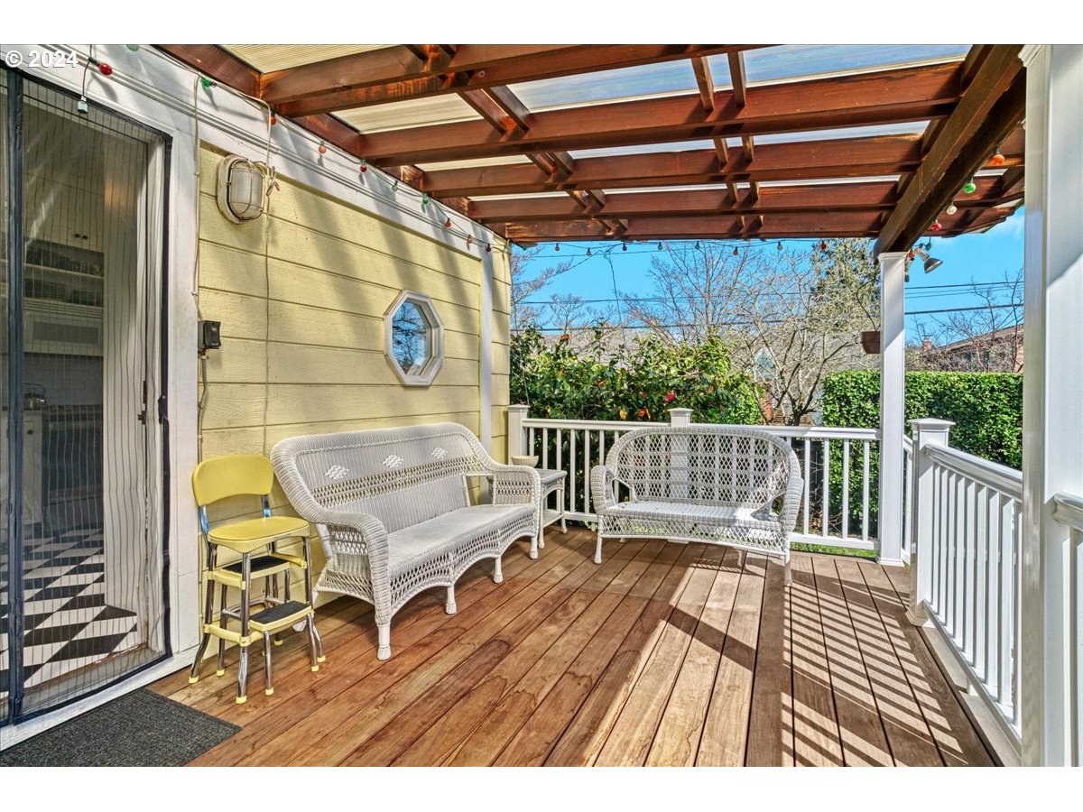 3752 Southeast Alder Street Portland, OR 97214 - Photo 34 of 44 a view of a patio with a table and chairs