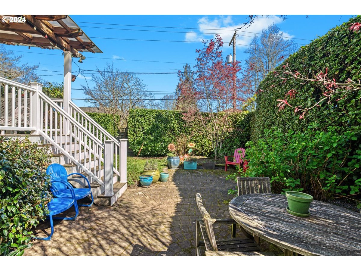 3752 Southeast Alder Street Portland, OR 97214 - Photo 37 of 44 a view of a house with backyard and sitting area