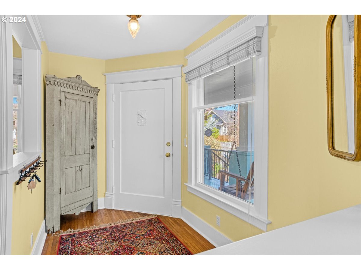 3752 Southeast Alder Street Portland, OR 97214 - Photo 9 of 44 a view of a bathroom with a glass door